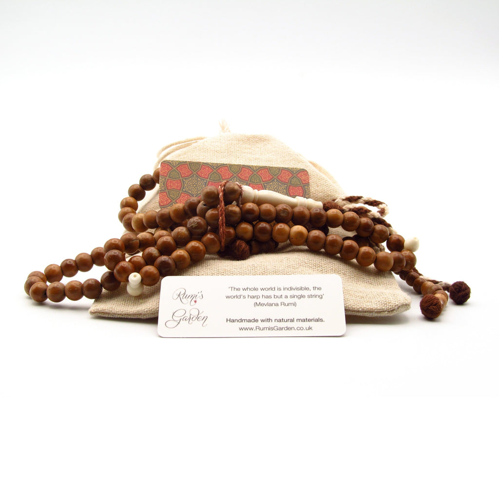 Coquille Nut Tasbih with camel bone alif for sale