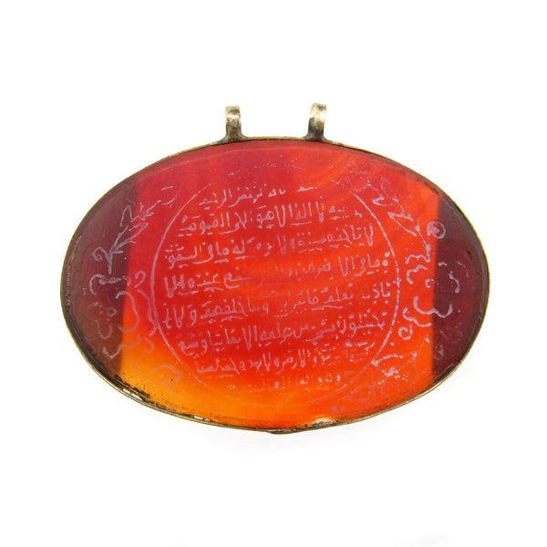 Afghan tawiz from 19th century with inscription of the Verse of the Throne in red gemstone